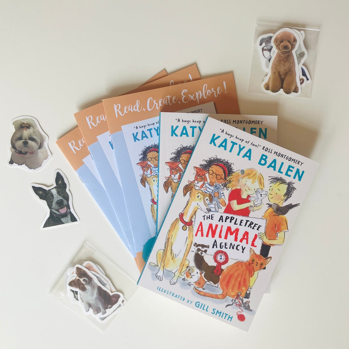 A children's book and activity booklet set including The Appletree Animal Agency by Katya Balen, from A Pocketful Of Books, a monthly kids book subscription.