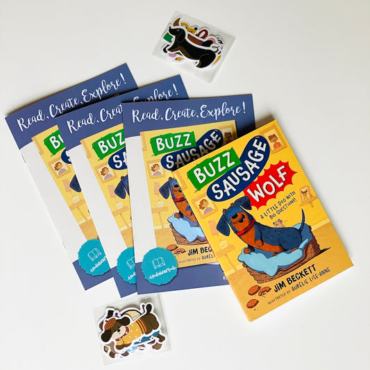 Kids' monthly book subscription featuring paperback Buzz sausage Wolf by Jim Beckett.
