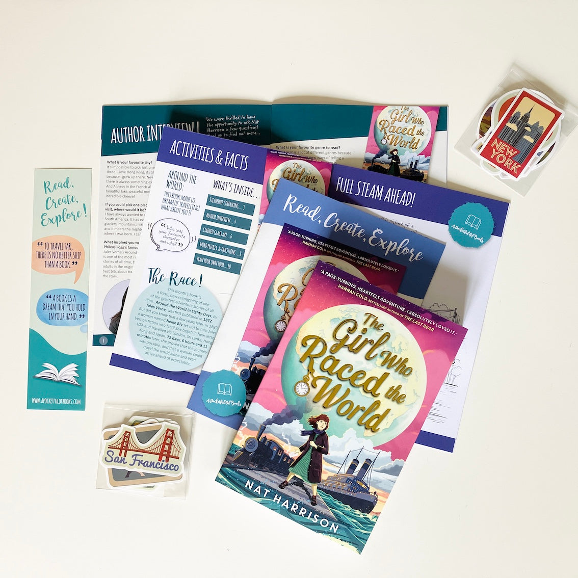 Kids monthly book subscription. Educational materials and book with 'The Girl Who Raced the World' by Nat Harrison on a white background
