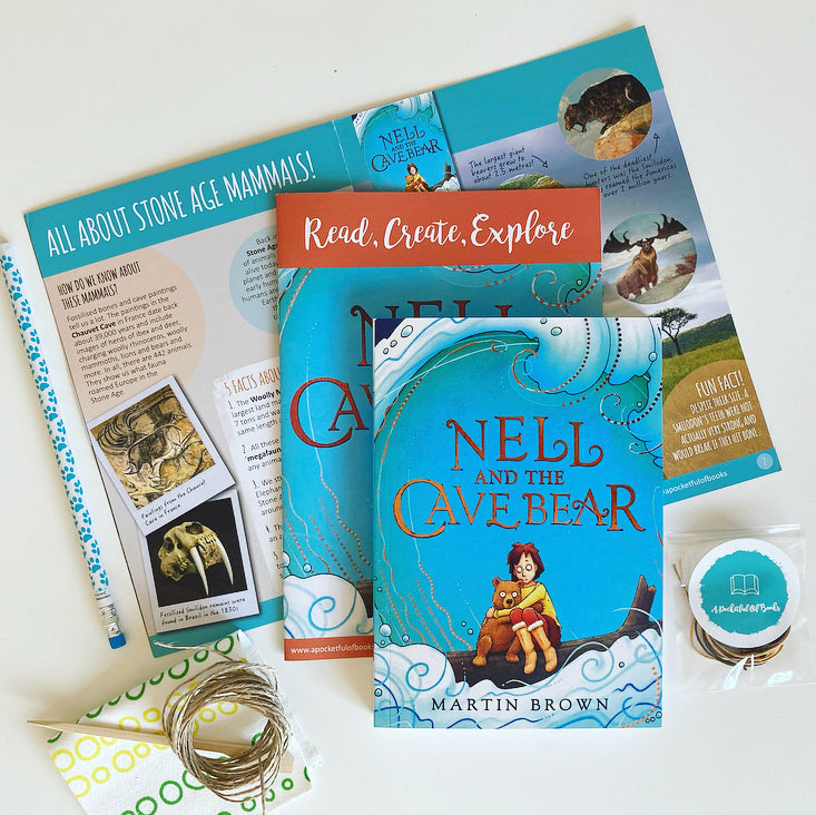 Children's subscription box A Pocketful of Books. Back issue featuring Nell and the cave Bear.